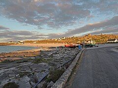 View walking from pier towards beach / O'Brien's Castle