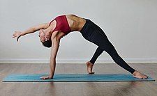 Chamatkarasana, Wild Thing Pose, a modern posture between Vasisthasana and Upward-Facing Bow Pose