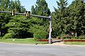 The entrance to the Cascades community along Cascades Parkway at Palisade Parkway. The Cascades logo can be seen in the lower right.