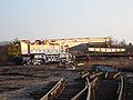 GrantRail Kirow 1200 removing scrap panels at Knighton Junction 2006