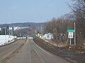 Looking north at the welcome sign