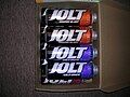 Cans of Jolt Cola in a shoebox.