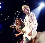 Kurt Cobain (foreground) and Krist Novoselic live at the 1992 MTV Video Music Awards.