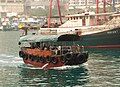 Small sampans are used as a common mode of transportation between Aberdeen & Ap Lei Chau Island.