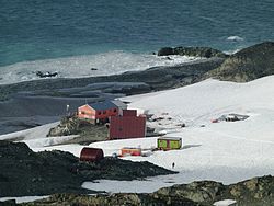 The Bulgarian base in 2012, with the new St. Ivan Rilski Chapel in the foreground and Russian Hut, Lame Dog Hut (painted light green), the Laboratory, Casa España and the Main Building in the background