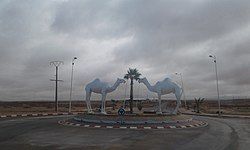 Two camel statues mark the entrance to Tan-Tan, 2009