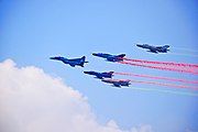 Mikoyan MiG-29 & Chengdu F-7 of Bangladesh Air Force fly over national parade ground