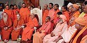 Bodhinatha attends a conference of Natha Sampradaya swamis hosted by Balagangadharanatha Swamiji. Includes Yogi Adityanath on center right.