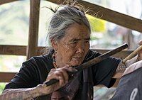 Whang-od applying a Kalinga tattoo