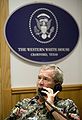 President George W. Bush speaks with the Prime Minister of Lebanon during a phone call at the Bush Ranch in Crawford, Texas, Saturday, Aug. 12, 2006.