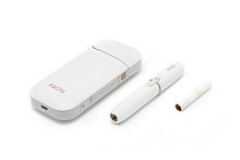 IQOS, consisting of a charger, holder, and tobacco stick.