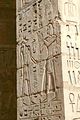 Ramesses III before Wepwawet in a relief from Medinet Habu, c.