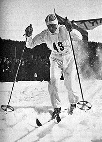 Swedish cross-country ski racer on a track set by other skiers, ca. 1935.