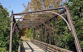 Bridge on the Works site, crossing French Creek (once carrying a spur from the Pickering Valley Railroad), constructed with Phoenix columns. 40°08′08.4″N 75°31′03″W﻿ / ﻿40.135667°N 75.51750°W﻿ / 40.135667; -75.51750﻿ (Phoenix Column Truss Bridge)