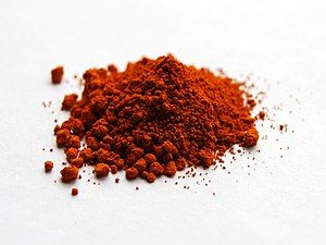 Alizarin was the first synthetic red dye, created by German chemists in 1868. It duplicated the colorant in the madder plant, but was cheaper and longer lasting. After its introduction, the production of natural dyes from the madder plant virtually ceased.