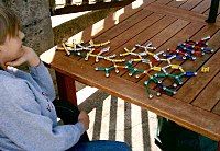 Those with AS often display intense interests, such as this boy's fascination with molecular structure.