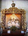 Holy Trinity statue in the style of Fridolin Leiber's painting, Santísima Trinidad Quasi-Parish, Malolos City, Philippines.[22]