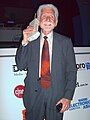 Image 24Martin Cooper of Motorola, shown here in a 2007 reenactment, made the first publicized handheld mobile phone call on a prototype DynaTAC model on 3 April 1973. (from Mobile phone)