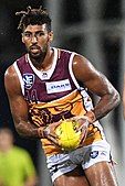 Archie Smith in 2019 as 6 ft 8 in (202 cm) Brisbane Lions ruck is the son of NBA basketball player Andre Moore