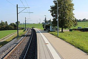 Single railway track, platform, and shelter