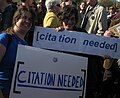 Chance meet of two {{citation needed}} signs at the rally