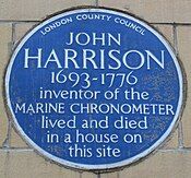 Blue plaque commemorating Harrison in Red Lion Square in London