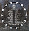 Plaque on exterior wall of École Polytechnique commemorating victims of massacre