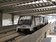 Alstom Innovia APM 300 approaching Charoen Nakhon station.