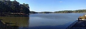 A photo of Choctaw Lake and the surrounding forest taken from above the spillway