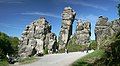 Image 13 Externsteine Photo credit: Daniel Schwen The Externsteine, a distinctive rock formation located in the Teutoburger Wald region of northwestern Germany, are a popular tourist attraction. Stairs and a small bridge connecting two of the rocks lead to the top.