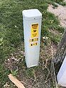 Telephone enclosure owned by TDS Telecom, a 3 foot tall enclosure, either cylindrical or cuboidal, with a sticker warning underground cables reside around it and requiring you to call a number before you dig around it