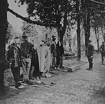 Civilians hanged in the local cemetery