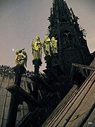 Three apostles with St. Matthew's angel in the foreground