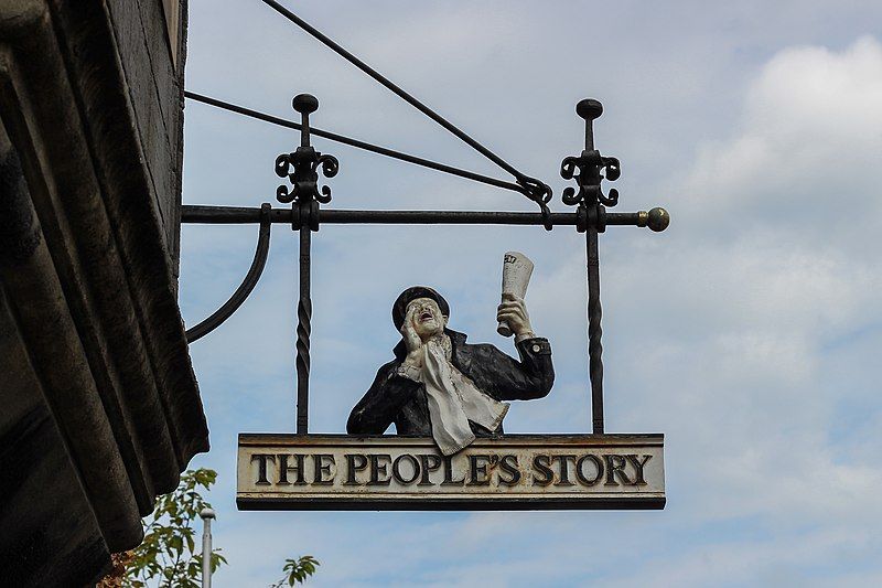 File:People'sStorySign.jpg