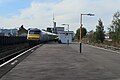 A CH Driving Van Trailer and silver set passing Bordesley.