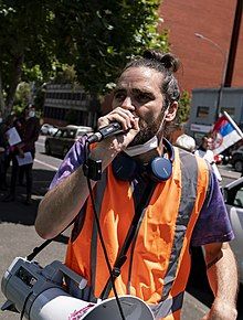 Ezekiel Ox performing at a rally in Melbourne in 2021.