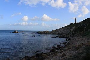 Image of Punta Carnero and its lighthouse, with Ceuta in the background.