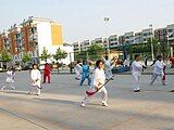 Old people practice Taiji in a residential area (2009)