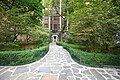 A courtyard view of The Lenru showing contrast of dark brick and masonry trim frame detailing.