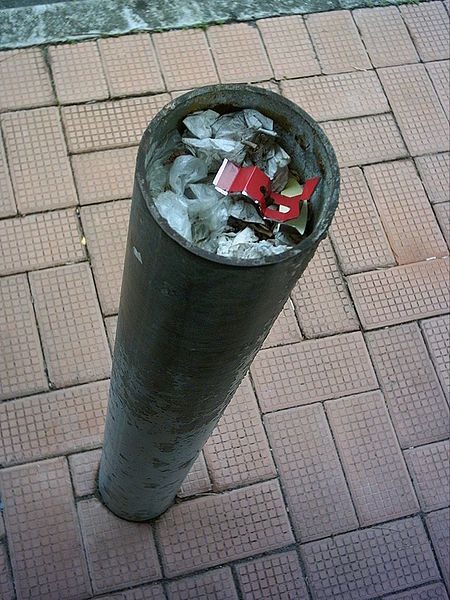 File:Rubbish filled pole.jpg