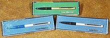 Three erasable pens in their cases.