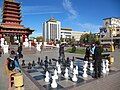 Playing chess near the Seven Days Pagoda, Elista