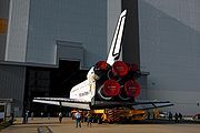 Endeavour on its way into the VAB during the launch preparations for STS-89. At the top of the doorway is the slot for the vertical stabilizer.