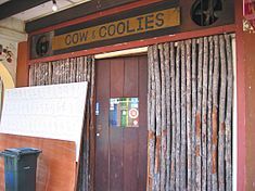 External façade of Cow & Coolies viewed from Mosque street.