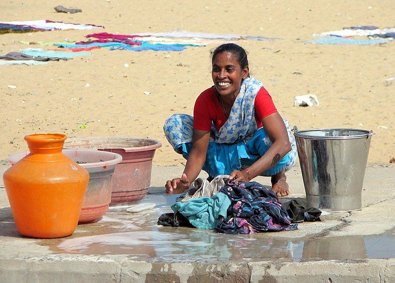 File:Woman doing laundry.jpg