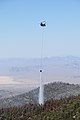 Helicopter dropping water near Angel Peak on July 1