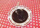 Lemang topped with fermented tapai made of black glutinous rice