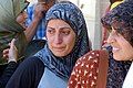 Distress on the face of a woman seeking refuge from the south Lebanon attacks, July 27.