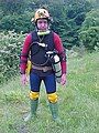 Front view of caving head light and small one-piece lights attached to caving helmet for shallow cave dives.