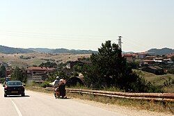 View from a road towards Komuniga